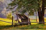 September Rural Scene In Mountains. Authentic Village And Fence Stock Photo