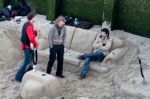 Chilling In A Sand Lounge By The River Thames Stock Photo