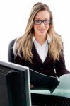 Young Female Sitting In Office Stock Photo