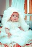 Little Baby Girl Before The Christening Stock Photo