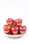 Pile Of Strawberries With Eyes And Mouths Stock Photo