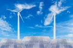 Solar Panels And Wind Turbine Stock Photo