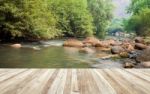 Wood Table And River And Stone With Tree In Forest Beautiful Nat Stock Photo