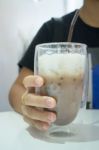 Glass Of Iced Milk Coffee Drink Stock Photo
