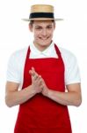 Young Male Chef Wearing Hat Stock Photo