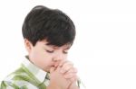 Boy Praying Stock Photo
