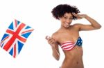 Hot American Bikini Model Saluting And Waving Uk Flag Stock Photo