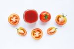 Healthy Drinks. Glass Of Tomato Juice And Pieces Of Fresh Tomato Stock Photo