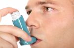 Close Up Of A Man With Asthma Pump Stock Photo