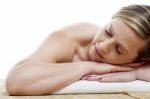 Woman Relaxing At Spa Centre Stock Photo