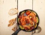 Roasted Shrimps With Zucchini And Tomatoes Stock Photo