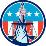 Hand Holding Scales Of Justice Circle Retro Stock Photo