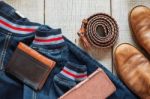 Denim And Accessories On Wooden Stock Photo