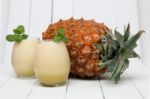 Fresh Pineapple Juice Isolated On A White Background Stock Photo