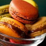 Colorful Macaroons In The Little Glass Blow Stock Photo