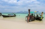 Long Boat At Tropical Beach, Thailand Stock Photo