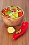 Wooden Bowl With Salad Stock Photo