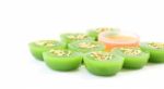 Side Of Green Multiple Scented Sesame Chinese Sweet On White Floor Stock Photo