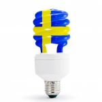 Sweden Flag On Energy Saving Lamp Stock Photo