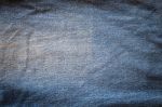 Texture Of Dark Fabric Blue Jeans Textile. Close Up Detail Background Stock Photo