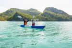 Travel By Boat With A Kayak Stock Photo