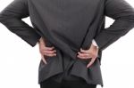 Young Businessman Having Some Lower Back Pain Stock Photo