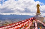 Boudhanath Stupa With Hundreds Of Pigeons And Prayer Flags In Sh Stock Photo