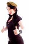 Pretty Young Female Posing With Her Thumbs Up Stock Photo