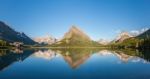 Mt Wilbur And Reflection At Swiftcurrent Lake In Glacier Nationa Stock Photo