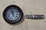 Dartmouth, Devon/uk - July 28 : Clock On The Wall In Foss Street Stock Photo