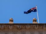 Australian Flag On The Top Of Building Stock Photo
