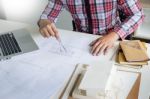 Person's Engineer Hand Drawing Plan On Blue Print Or Working Pro Stock Photo