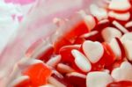 Red White Heart Shape Jelly Candy Bonbon Snack Group. Sweet For Valentines Day Background Stock Photo