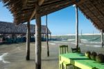 Hammocks And Beach Chairs Under The Shade Of A Palapa Sun Roof U Stock Photo