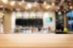 Selected Focus Empty Brown Wooden Table And Coffee Shop Or Resta Stock Photo