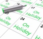 On Holiday Calendar Shows Annual Leave Or Time Off Stock Photo
