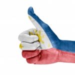 Philippines Flag On Thumb Up Hand Stock Photo