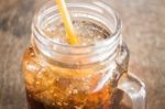 Refreshing Brown Soda With Ice Stock Photo