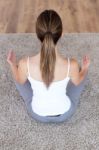 Beautiful Young Woman Doing Yoga Exercises At Home Stock Photo