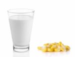 Fresh Milk In The Glass With Corn On White Background Stock Photo