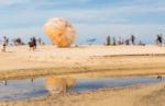 Abstract Of Blurred People On The Beach Stock Photo