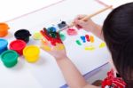 Asian Girl Painting Her Palm Using Drawing Tools, Art Education Stock Photo