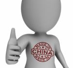 Made In China Stamp On Man Shows Chinese Products Stock Photo