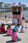Punch And Judy Show In Southwold Stock Photo