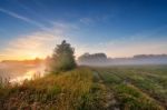 Summer Misty Sunrise On The River. Foggy River In The Morning. S Stock Photo