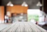 Abstract Blur Coffee Shop With White Empty Table Top Stock Photo