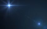 Abstract Lens Flare Blue Star Stock Photo