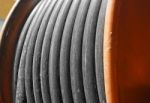 Large Metal Coil With Electric Cable Stock Photo