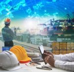 Hand Of Business Man Working On Working Table In Container Dock Use For Logistic Industry And Import Export , Freight Cargo Shipping Industrial Stock Photo