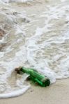 Message In The Bottle Washed Ashore Stock Photo